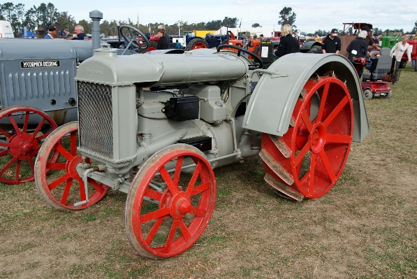 Tractor wheel farming vehicle Photo