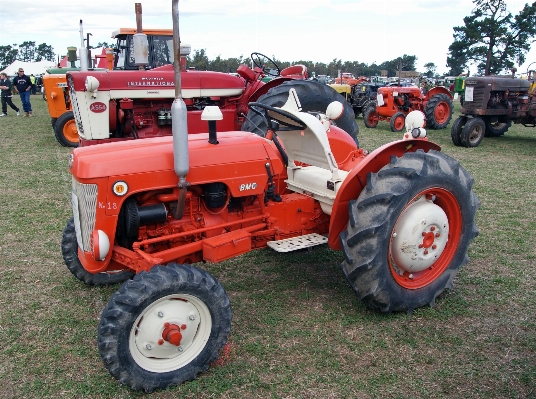 Tractor wheel farming vehicle Photo