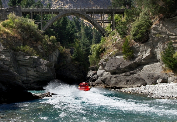 Boat river red vehicle Photo