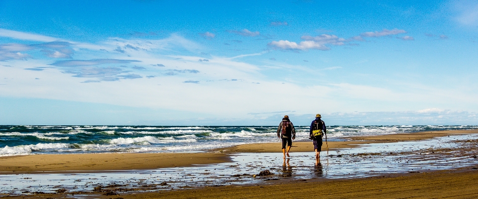 Man beach sea coast Photo