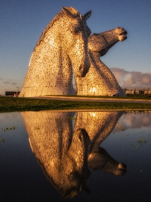 Morning statue reflection sculpture Photo