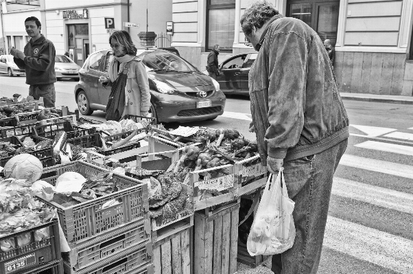 Black and white people road street Photo