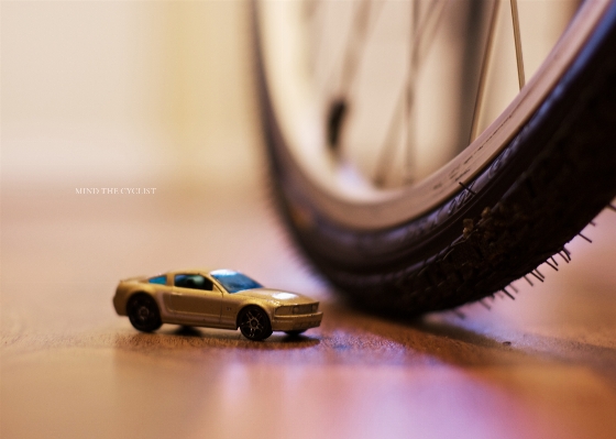 Car wheel driving bicycle Photo