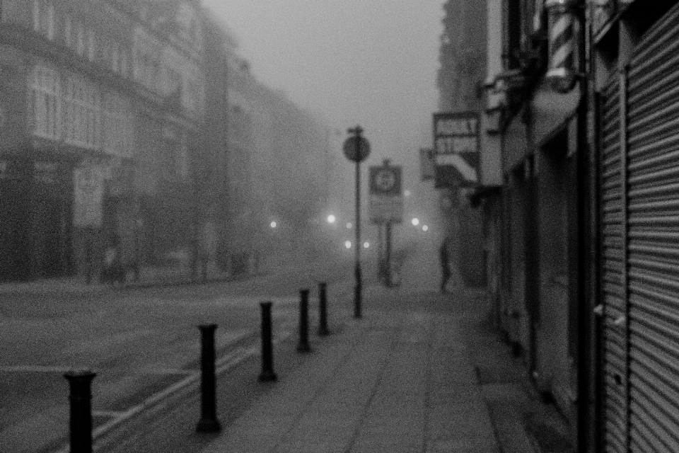 Black and white fog road street