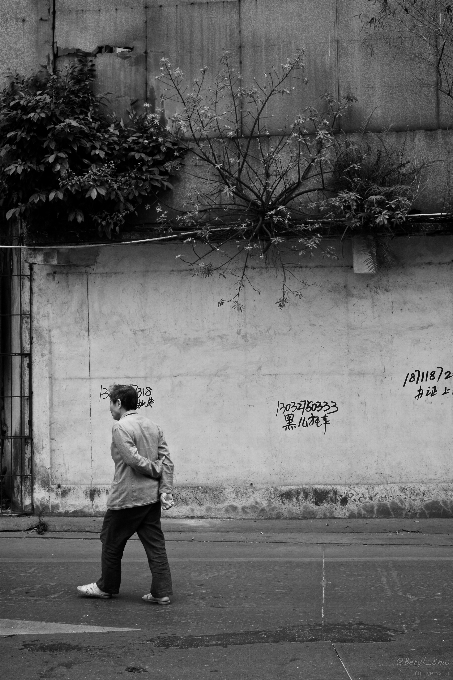 Walking black and white road