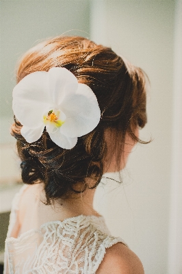 Woman hair white flower Photo