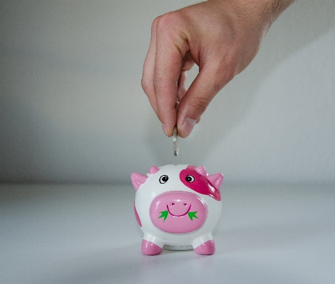 Hand finger ceramic money Photo