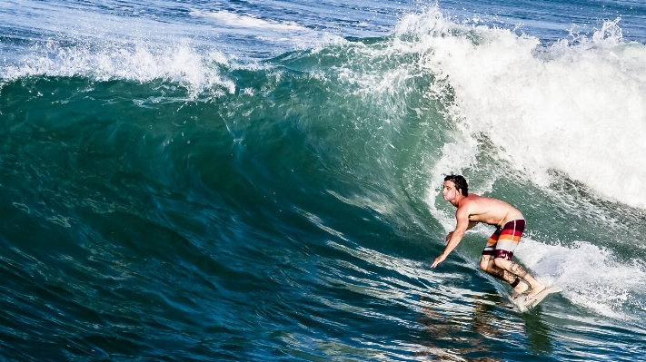 Man beach sea water Photo