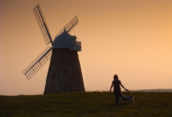 Girl sunset windmill wind Photo