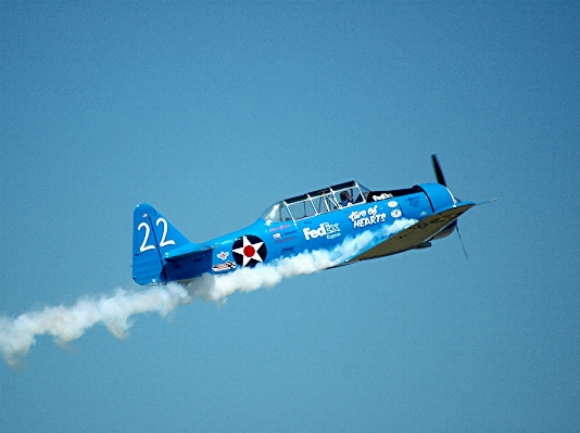 Wing sky trail smoke Photo