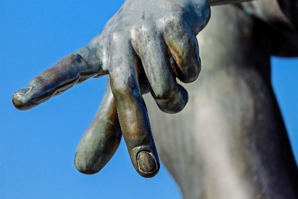 Hand sky monument swim Photo