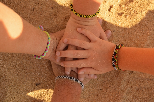 Hand beach sand girl Photo