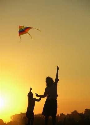 Silhouette sky woman sunset Photo