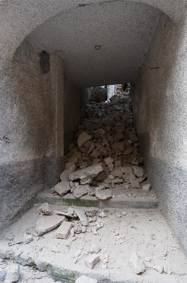 House alley wall rubble Photo