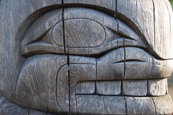 Wood statue symbol tire Photo