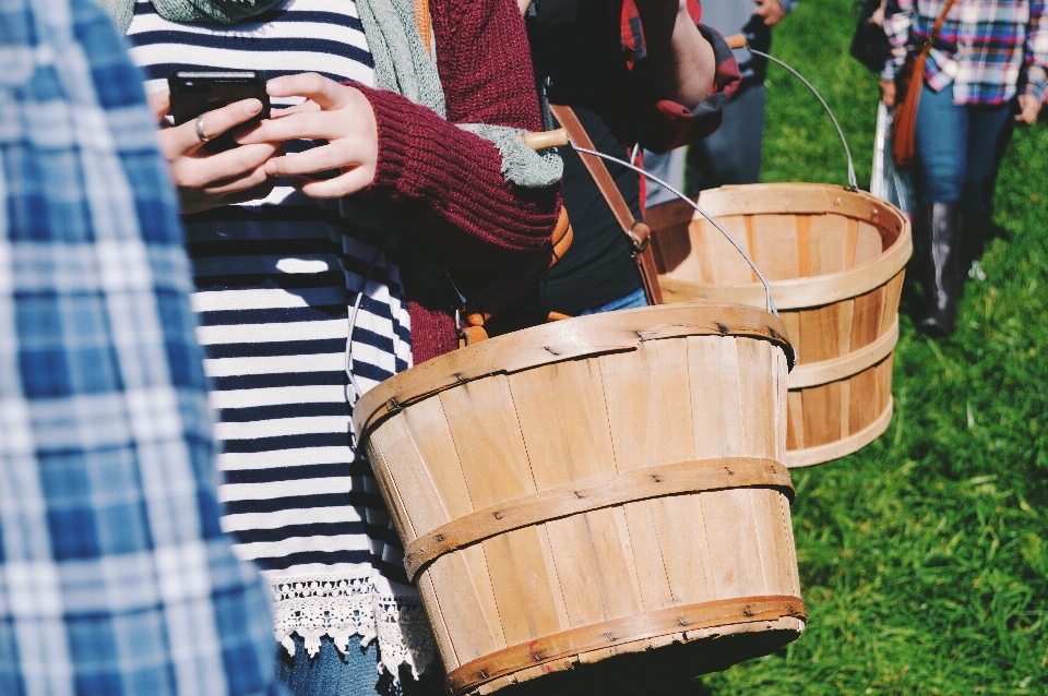 Hand person phone basket