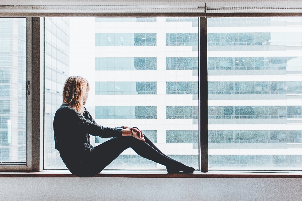 Woman window female sitting