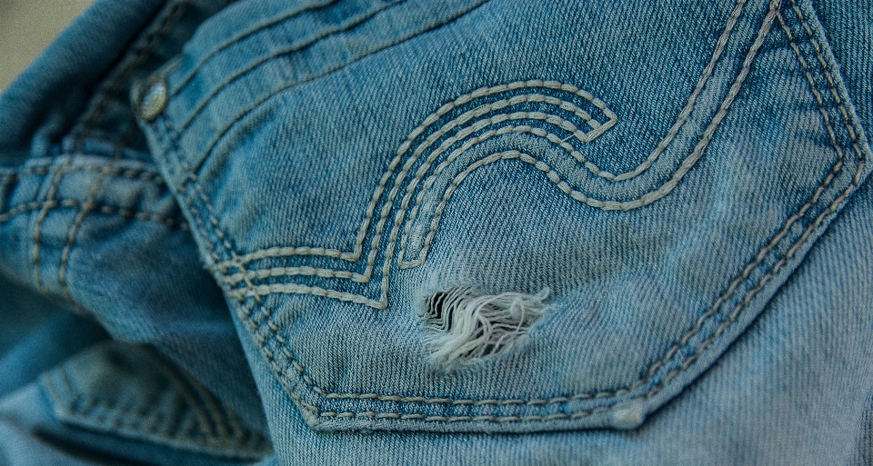 Hole old jeans blue