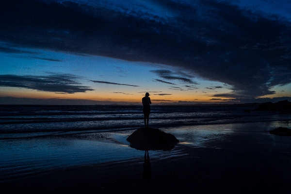 Foto Pria pantai laut pesisir