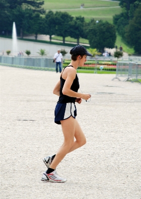 Person running city cityscape Photo