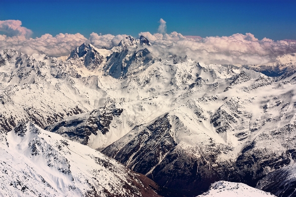 Mountain snow winter sky Photo