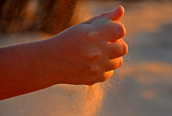 Hand sand escape leg Photo