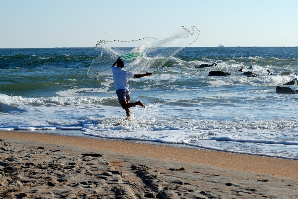 Man beach landscape sea Photo