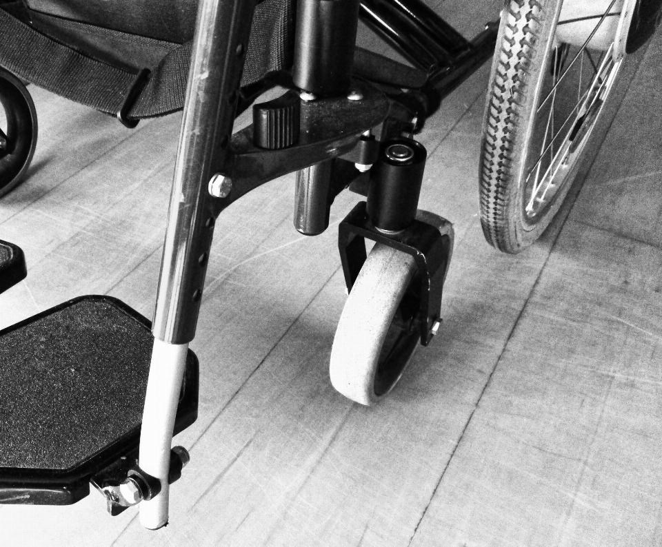 Black and white wheel chair vehicle