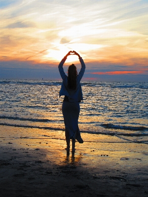 Hand beach sea coast Photo