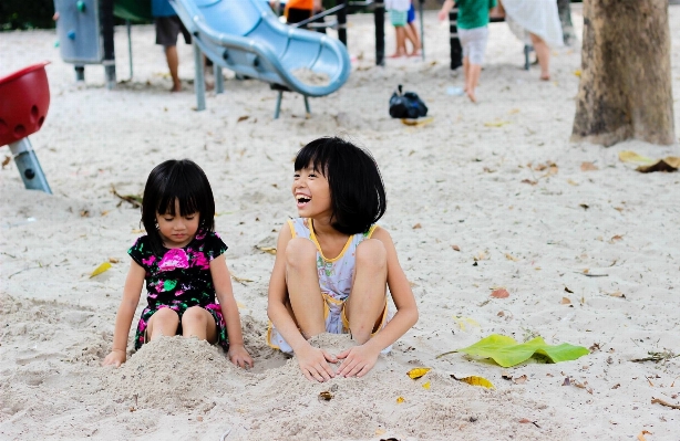 Foto Pantai pasir rakyat gadis