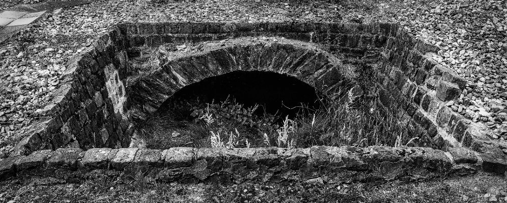 Rock black and white hole tunnel Photo