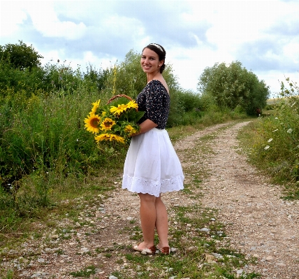 People woman meadow flower Photo