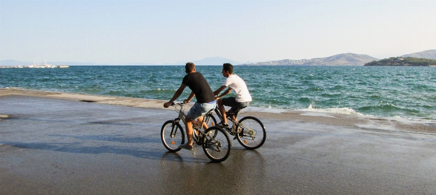 Beach sea coast bicycle Photo