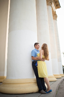 Sitting couple romance yellow Photo