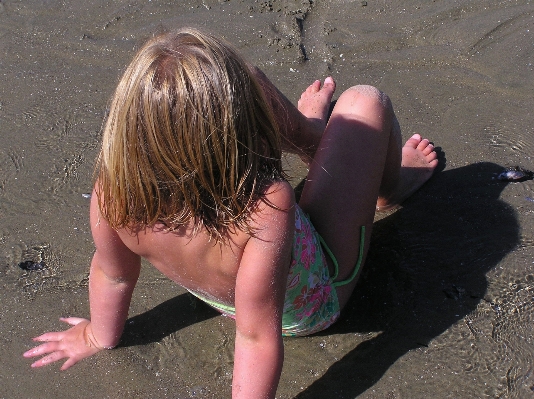 Hand beach sea water Photo