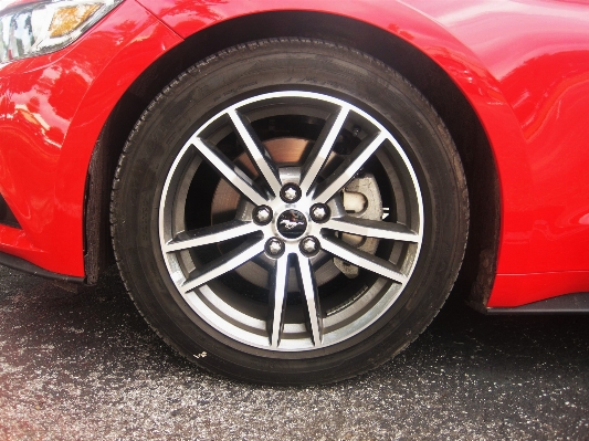 Car wheel red vehicle Photo