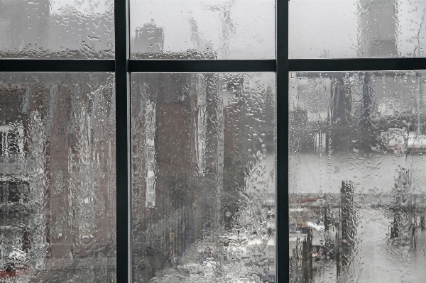 Snow winter rain window Photo