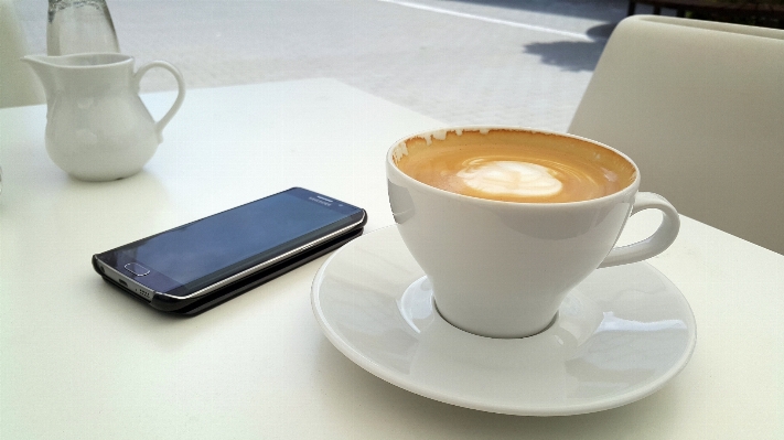 Smartphone cafe coffee restaurant Photo