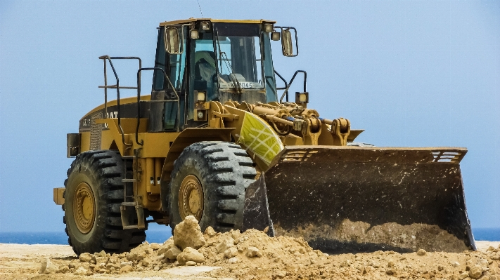 Tractor field asphalt construction Photo