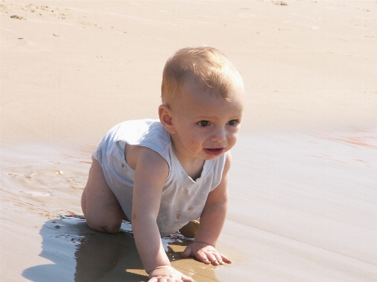 Hand beach sea sand Photo