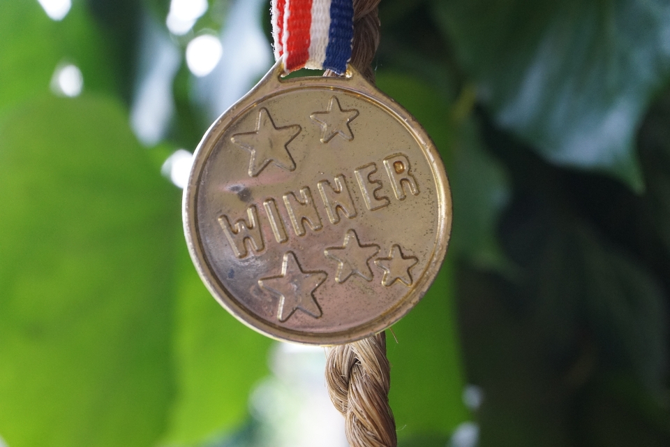 Close up gold first medal