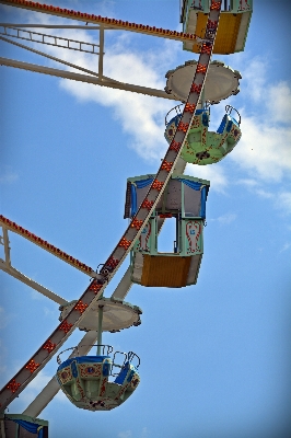 Jumping vehicle ferris wheel amusement park Photo