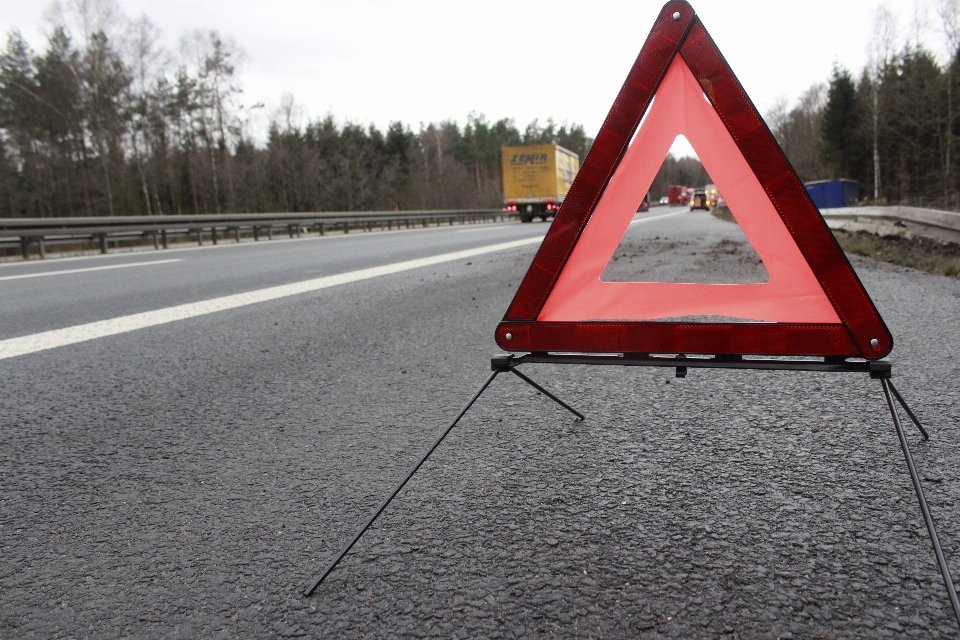 Traffic highway asphalt sign