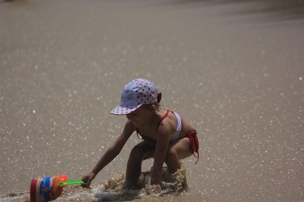 Beach water sand play Photo