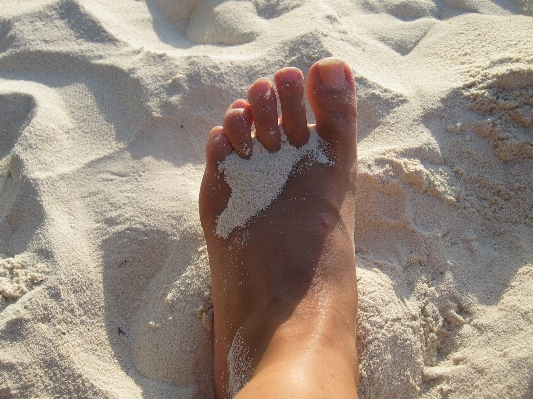 Hand meer sand sonne Foto