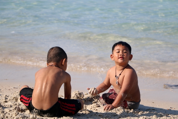 Man beach sea coast Photo