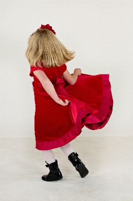 Girl running cute red Photo