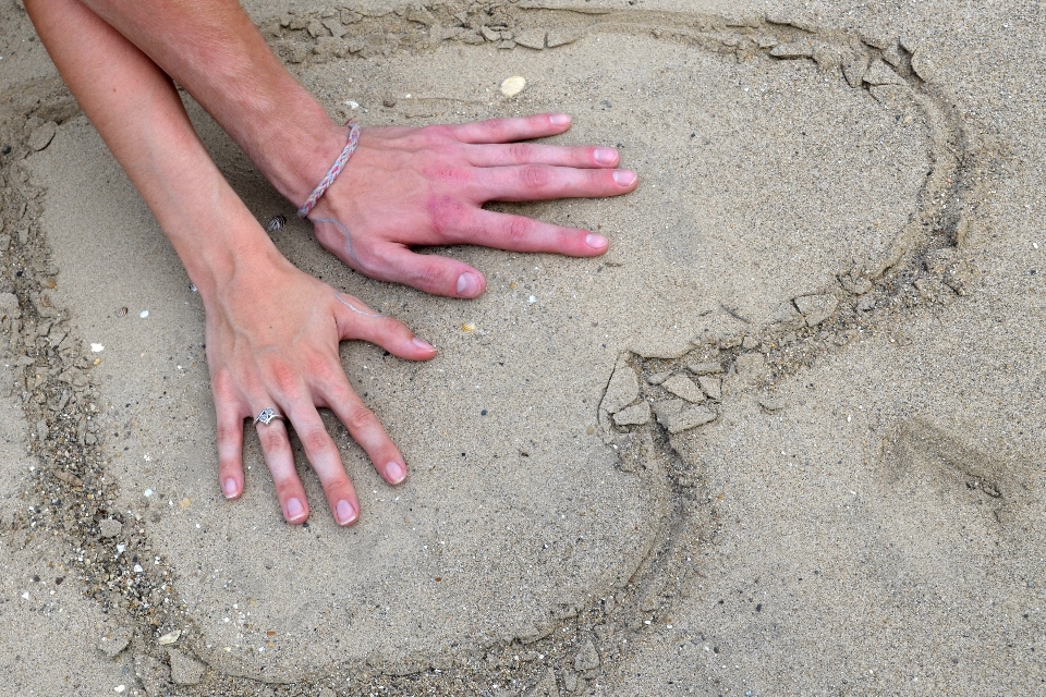 Hand beach sand travel