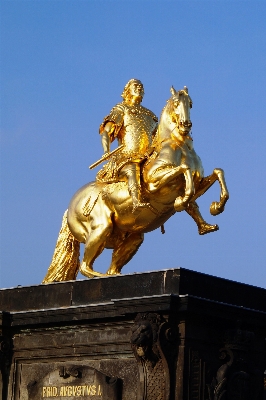 Monument statue golden horse Photo