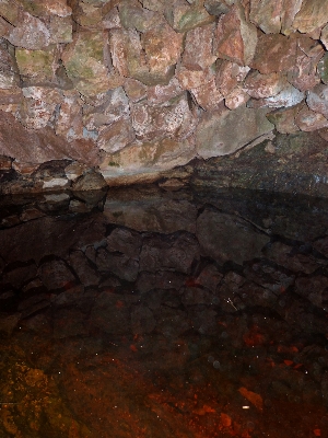 Rock formation cave reflection Photo